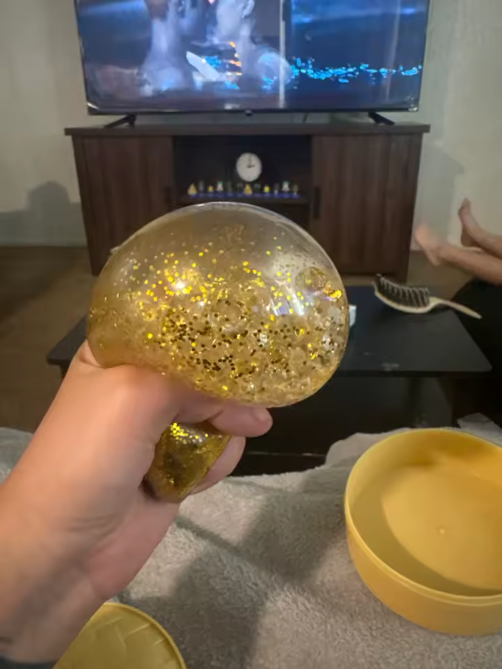 Gold glitter squishy squeezed at home